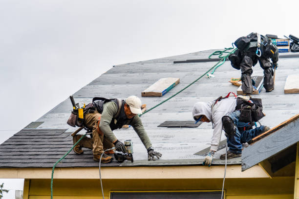 Professional Roofing technician working in California, CA